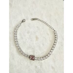 Light pink emerald cut tennis bracelet